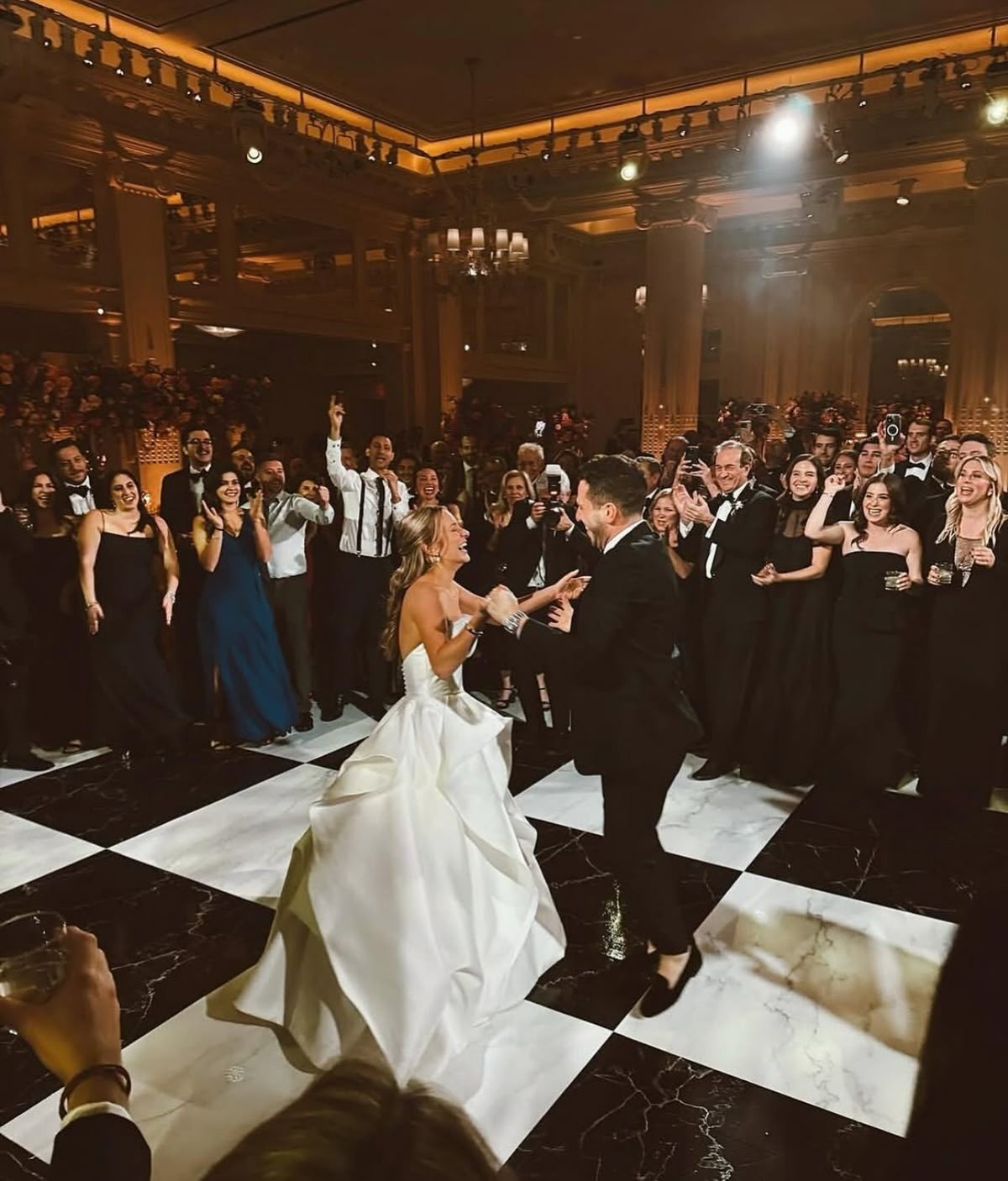 Black and white checkerboard dance floor rental set up for a Phoenix wedding reception