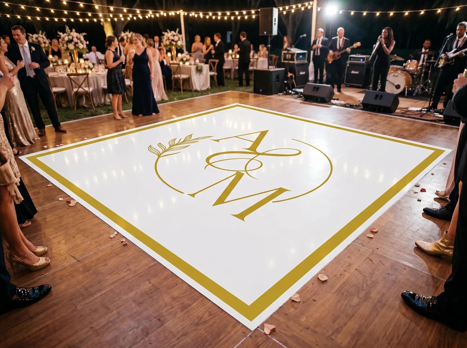Custom printed vinyl wrap dance floor with couple's initials at a Phoenix wedding